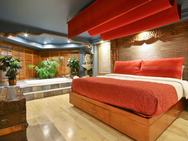 Hôtel Québec Inn : photo 1 de la chambre suite lit king-size avec canapé-lit - thème polynésien