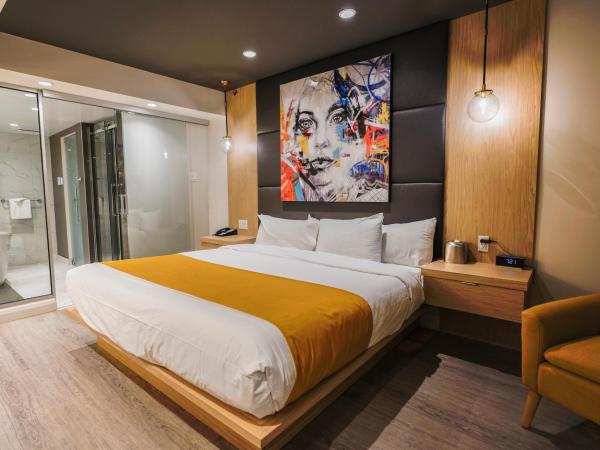 Hôtel Québec Inn : photo 1 de la chambre suite lit queen-size - thème asiatique