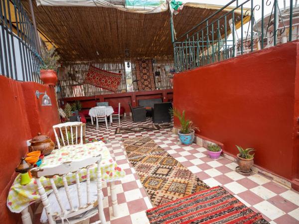 Fes Hostel Home : photo 1 de la chambre chambre triple avec salle de bains privative