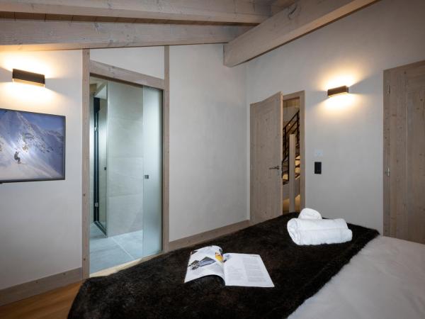 MGM Hôtels & Résidences - Résidence Le Roc Des Tours : photo 9 de la chambre appartement prestige 4 chambres pour 10 personnes avec accès au spa