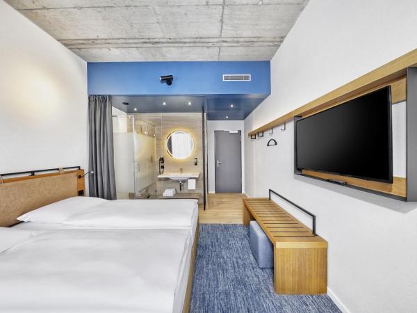 H2 Hotel Düsseldorf Seestern : photo 3 de la chambre chambre lits jumeaux confort