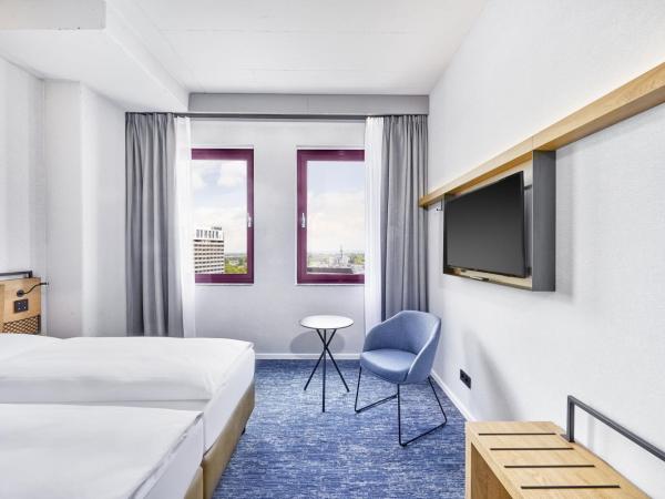 H2 Hotel Düsseldorf Seestern : photo 5 de la chambre chambre lits jumeaux confort