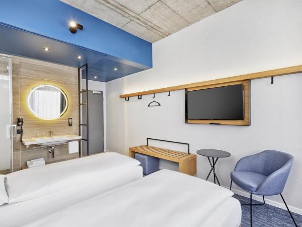 H2 Hotel Düsseldorf Seestern : photo 7 de la chambre chambre lits jumeaux confort