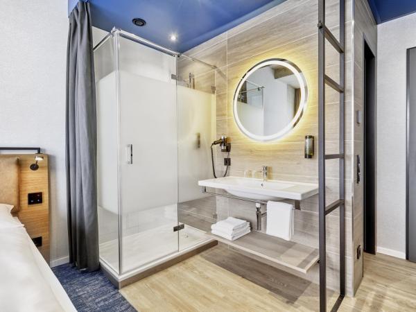 H2 Hotel Düsseldorf Seestern : photo 8 de la chambre chambre lits jumeaux confort