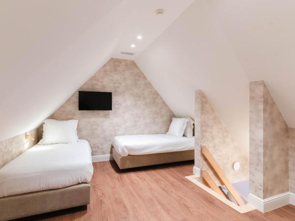 Golden Tree Hotel : photo 3 de la chambre chambre familiale en duplex