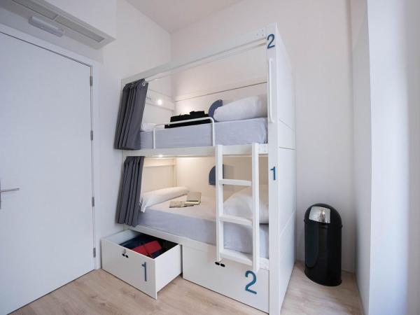 room00 Gran Vía Hostel : photo 3 de la chambre lit simple dans dortoir pour femmes