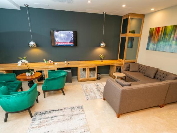 The Gate 30 Suites Ataşehir : photo 6 de la chambre suite - vue sur jardin