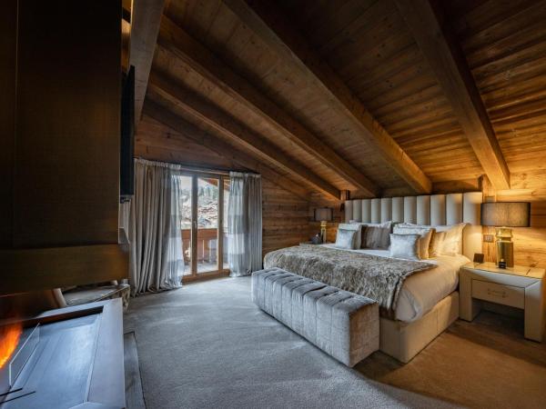 Ultima Gstaad : photo 2 de la chambre suite prestige avec 2 chambres, 2 salles de bains et salon