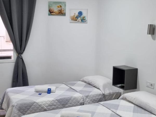 Hostal Vara Madrid : photo 2 de la chambre chambre lits jumeaux