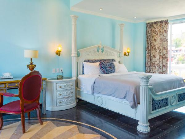 Hotel Boutique Rivera Del Rio : photo 7 de la chambre chambre lit king-size - vue sur mer