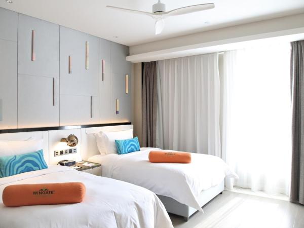 Wingate by Wyndham Sanya Luhuitou : photo 1 de la chambre chambre lits jumeaux de luxe avec vue sur la montagne - fumeurs