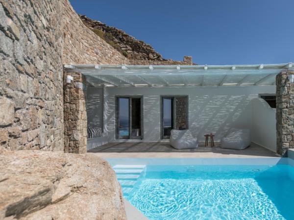 Arocaria Mykonos : photo 1 de la chambre suite lit queen-size