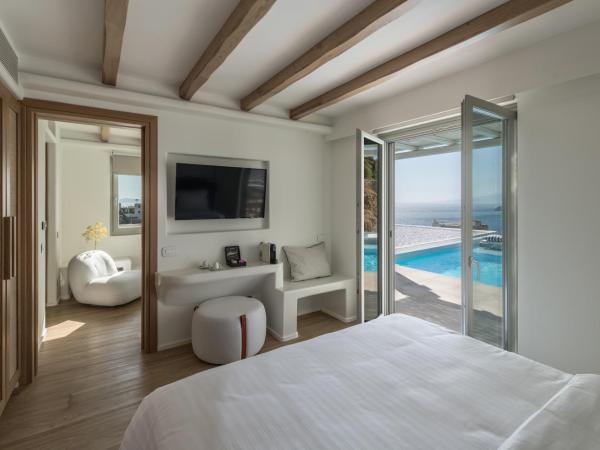 Arocaria Mykonos : photo 7 de la chambre suite lit queen-size