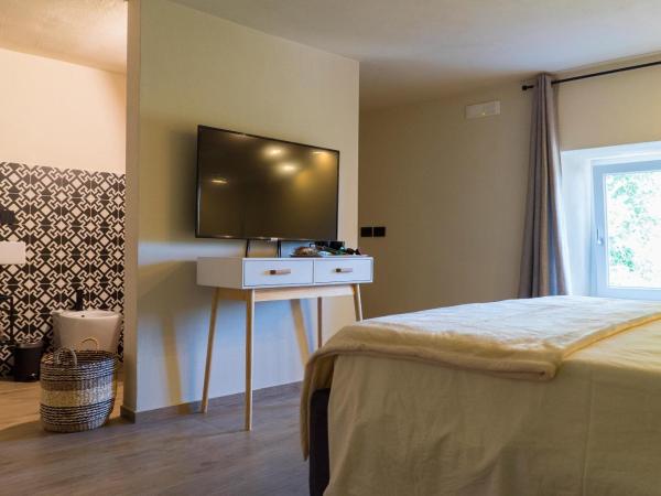 Tesoro Nascosto B&B : photo 2 de la chambre chambre lit queen-size avec baignoire spa