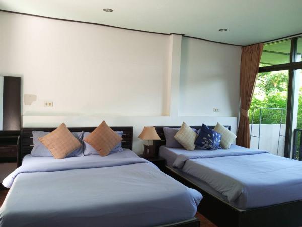 Faye Orchid Garden Resort : photo 4 de la chambre quadruple bungalow with garden view