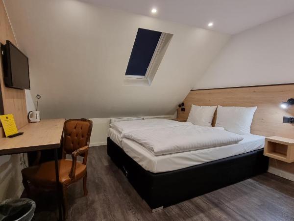 JJ Hotel Hannover-City-Pension : photo 3 de la chambre chambre double standard