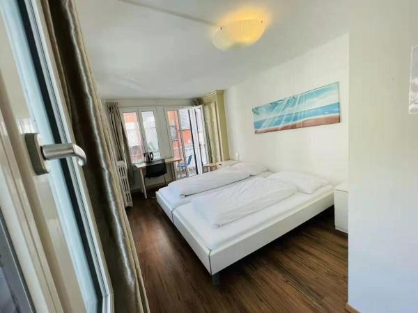 Interlaken Linda Inn Lodge : photo 1 de la chambre chambre double avec salle de bains privative