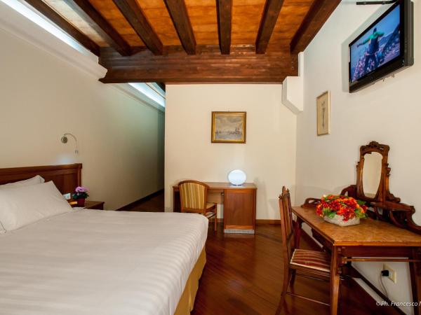 Hotel Flora : photo 3 de la chambre chambre double ou lits jumeaux