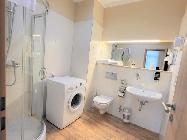 Marcel Apartments Leipzig : photo 4 de la chambre appartement avec balcon