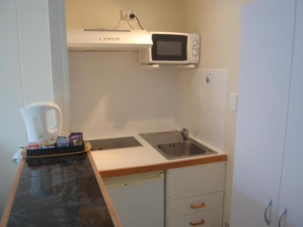 Rotorua Motel : photo 2 de la chambre studio lit queen-size avec spa