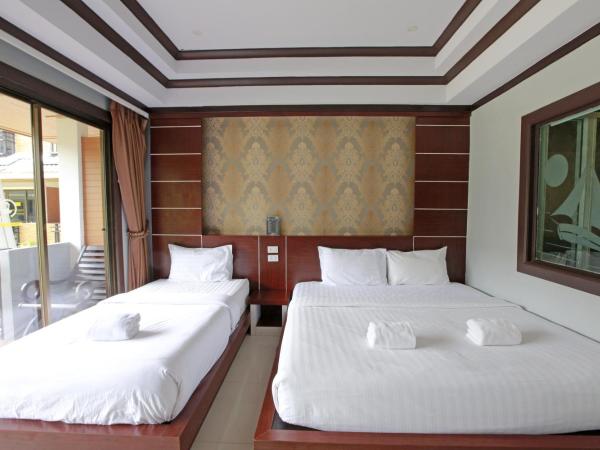 Phi Phi Andaman Beach Resort-SHA Plus : photo 5 de la chambre chambre triple deluxe