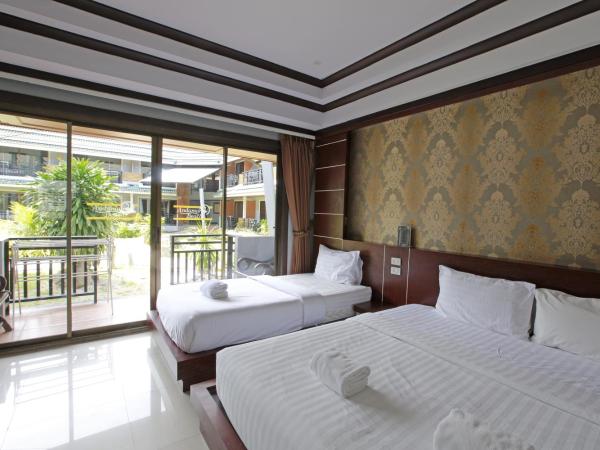 Phi Phi Andaman Beach Resort-SHA Plus : photo 6 de la chambre chambre triple deluxe