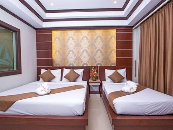 Phi Phi Andaman Beach Resort-SHA Plus : photo 1 de la chambre chambre triple deluxe
