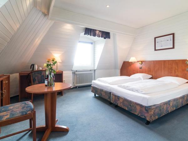 Tagungshotel Höchster Hof : photo 8 de la chambre chambre double ou lits jumeaux