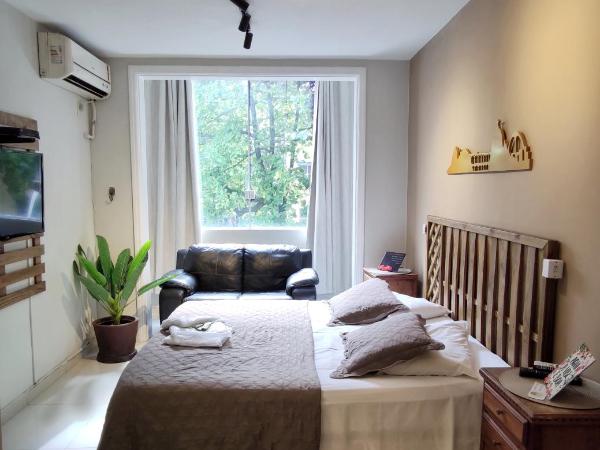 Baixo Copa Guest House : photo 1 de la chambre chambre double supérieure avec salle de bains privative