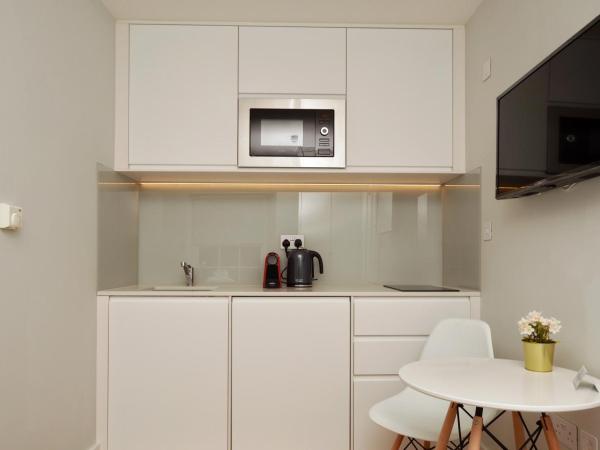 The Portobello Serviced Apartments by StayPrime : photo 4 de la chambre petit studio - sous-sol