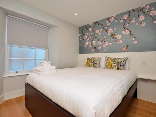 The Portobello Serviced Apartments by StayPrime : photo 1 de la chambre petit studio - sous-sol