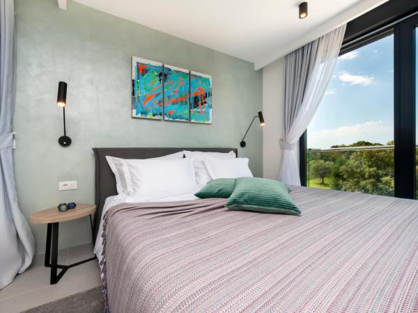 Luxury Residence Levante : photo 2 de la chambre studio lit king-size deluxe