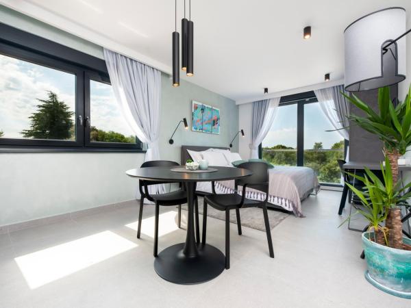 Luxury Residence Levante : photo 1 de la chambre studio lit king-size deluxe