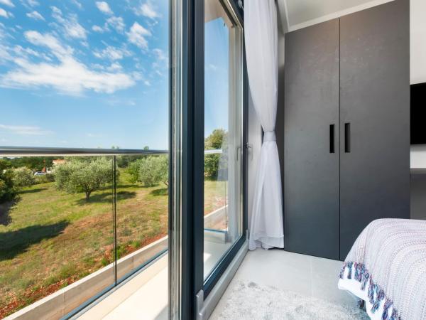 Luxury Residence Levante : photo 4 de la chambre studio lit king-size deluxe