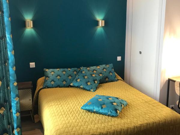 Les Pastels : photo 1 de la chambre chambre double avec baignoire