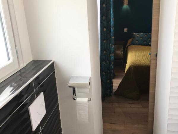 Les Pastels : photo 4 de la chambre chambre double avec baignoire