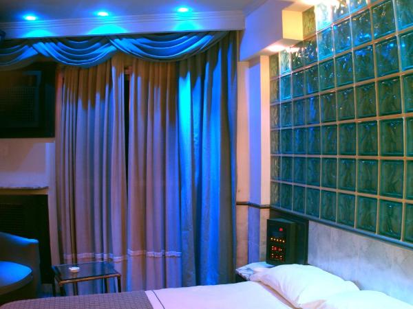 Dallas Hotel -Motel- : photo 8 de la chambre chambre lit queen-size 