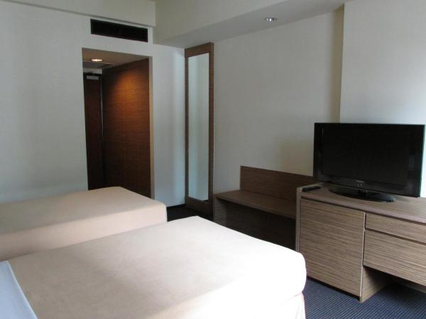 Strand Hotel : photo 2 de la chambre chambre lits jumeaux deluxe