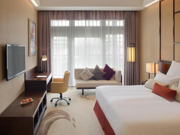 Radisson Blu Resort Wetland Park : photo 6 de la chambre suite junior lit king-size