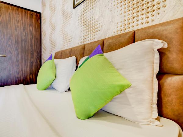 Treebo Kuval Inn : photo 9 de la chambre chambre double standard