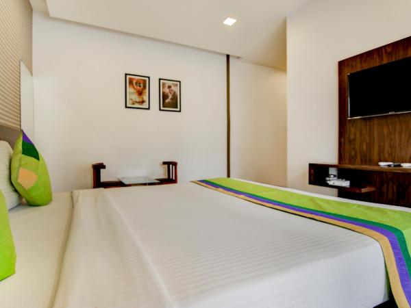 Treebo Kuval Inn : photo 4 de la chambre chambre double deluxe