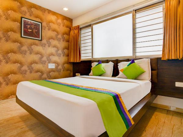 Treebo Kuval Inn : photo 1 de la chambre chambre double supérieure