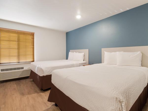 WoodSpring Suites Houston I-45 Airtex : photo 7 de la chambre studio avec 2 lits doubles