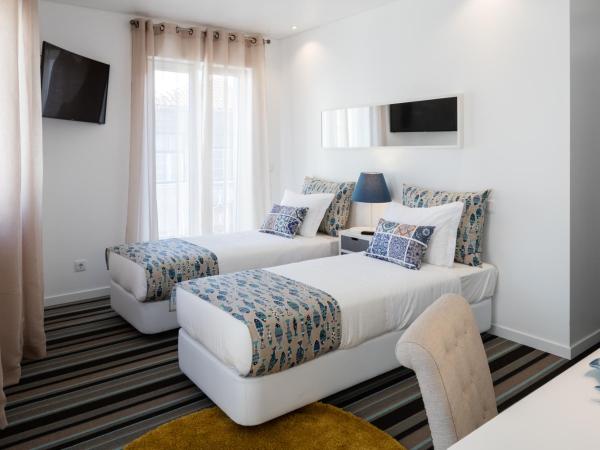 Marino Lisboa Boutique Guest House : photo 4 de la chambre chambre double ou lits jumeaux deluxe avec balcon