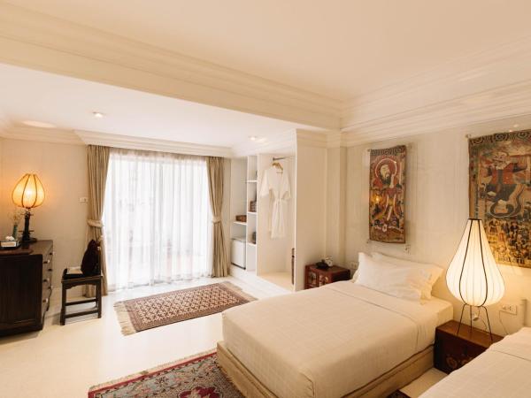 At Niman : photo 4 de la chambre chambre deluxe double ou lits jumeaux