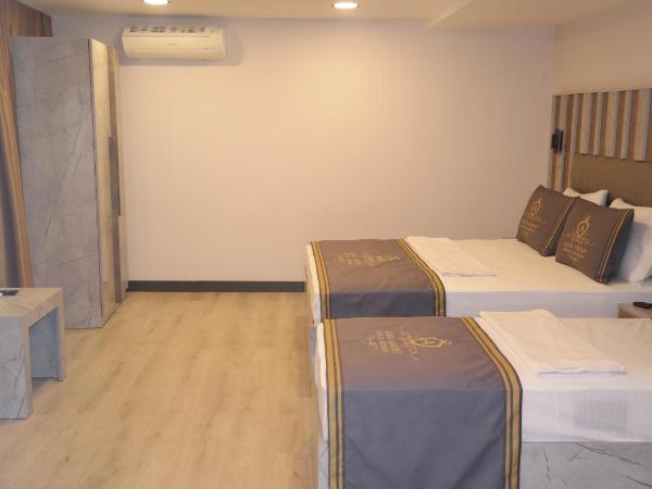 ByAKKAN HOTEL : photo 8 de la chambre chambre triple avec balcon