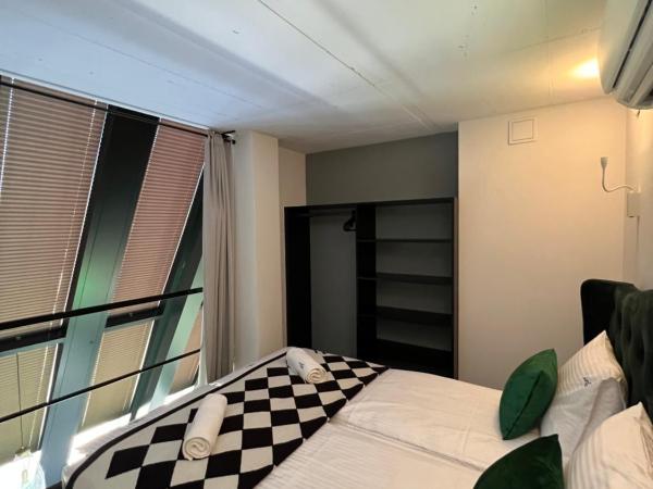 NEON APARTMENTS : photo 3 de la chambre appartement en duplex