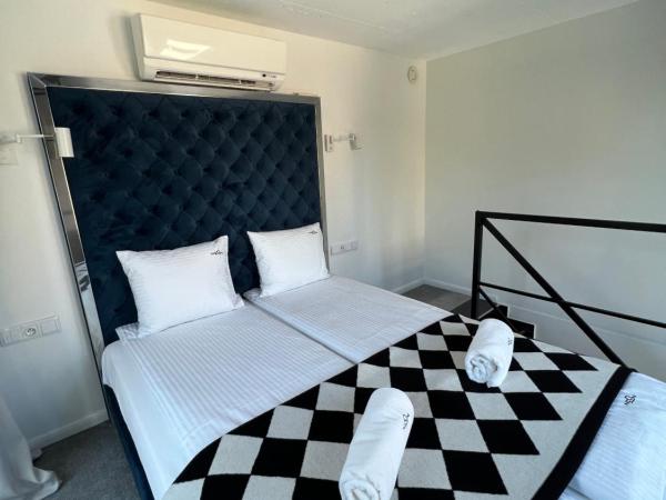 NEON APARTMENTS : photo 4 de la chambre appartement en duplex