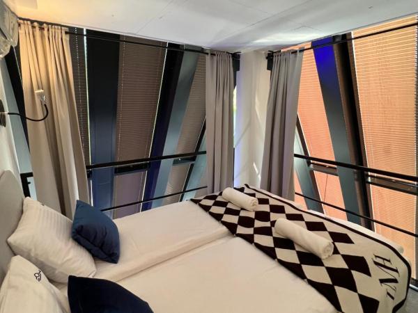 NEON APARTMENTS : photo 3 de la chambre appartement en duplex