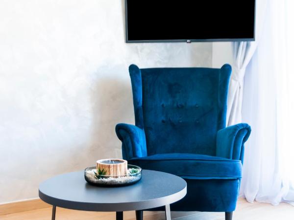 Luxury Residence Levante : photo 10 de la chambre appartement - vue sur jardin